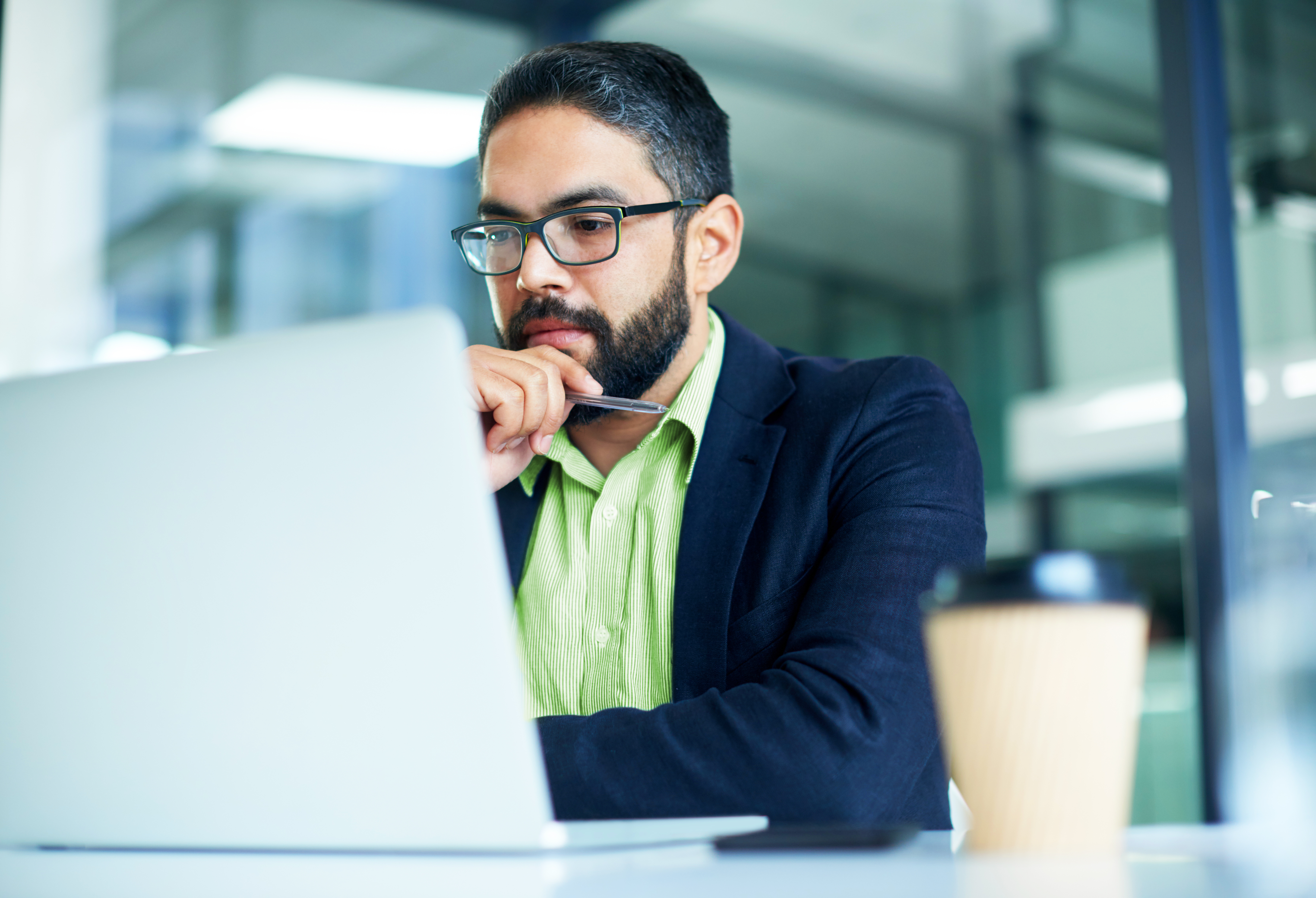 GettyImages-1180357582-Man_Looking_at_Laptop-RET (1)