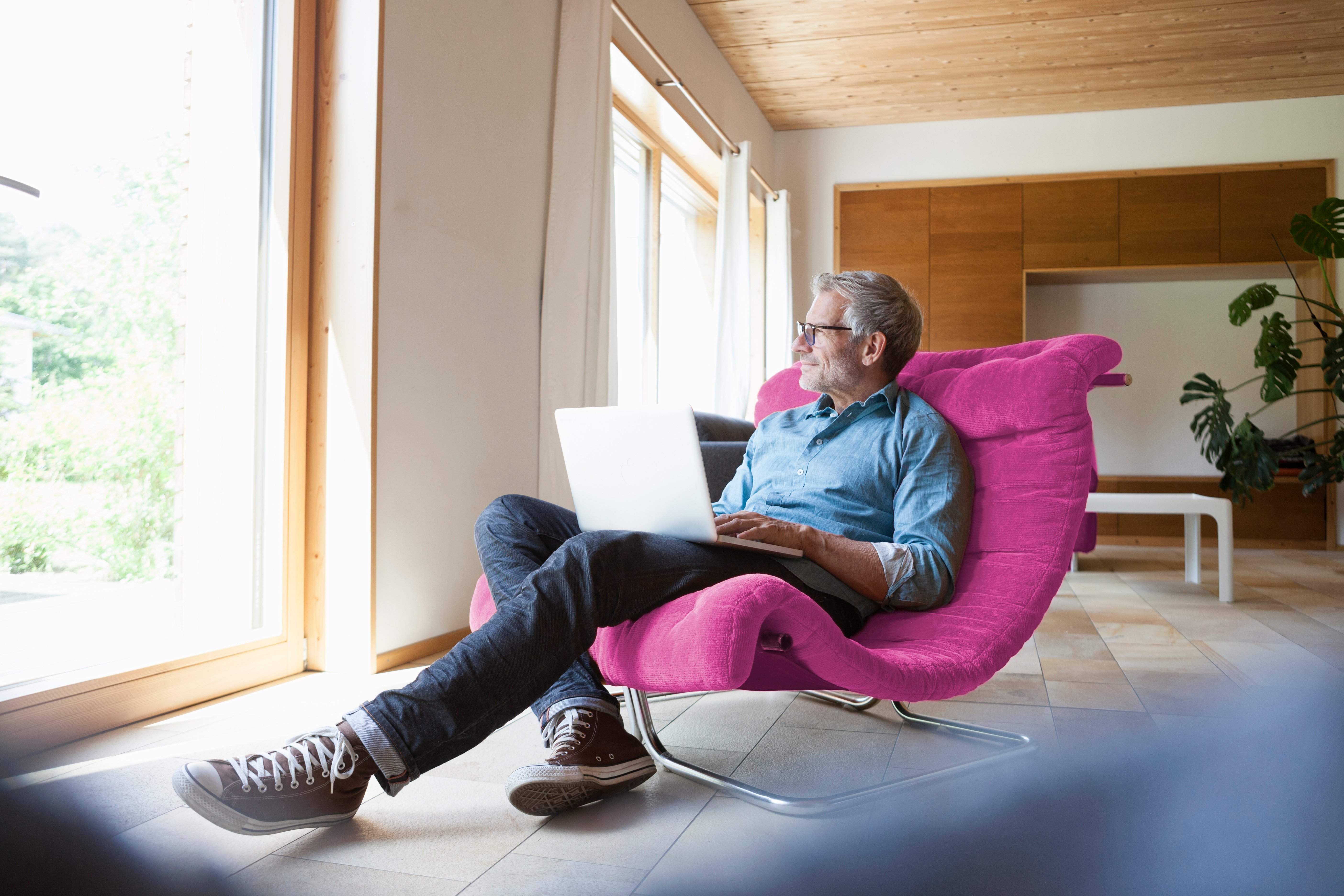 GettyImages-673115681-Man_with_Laptop-RET