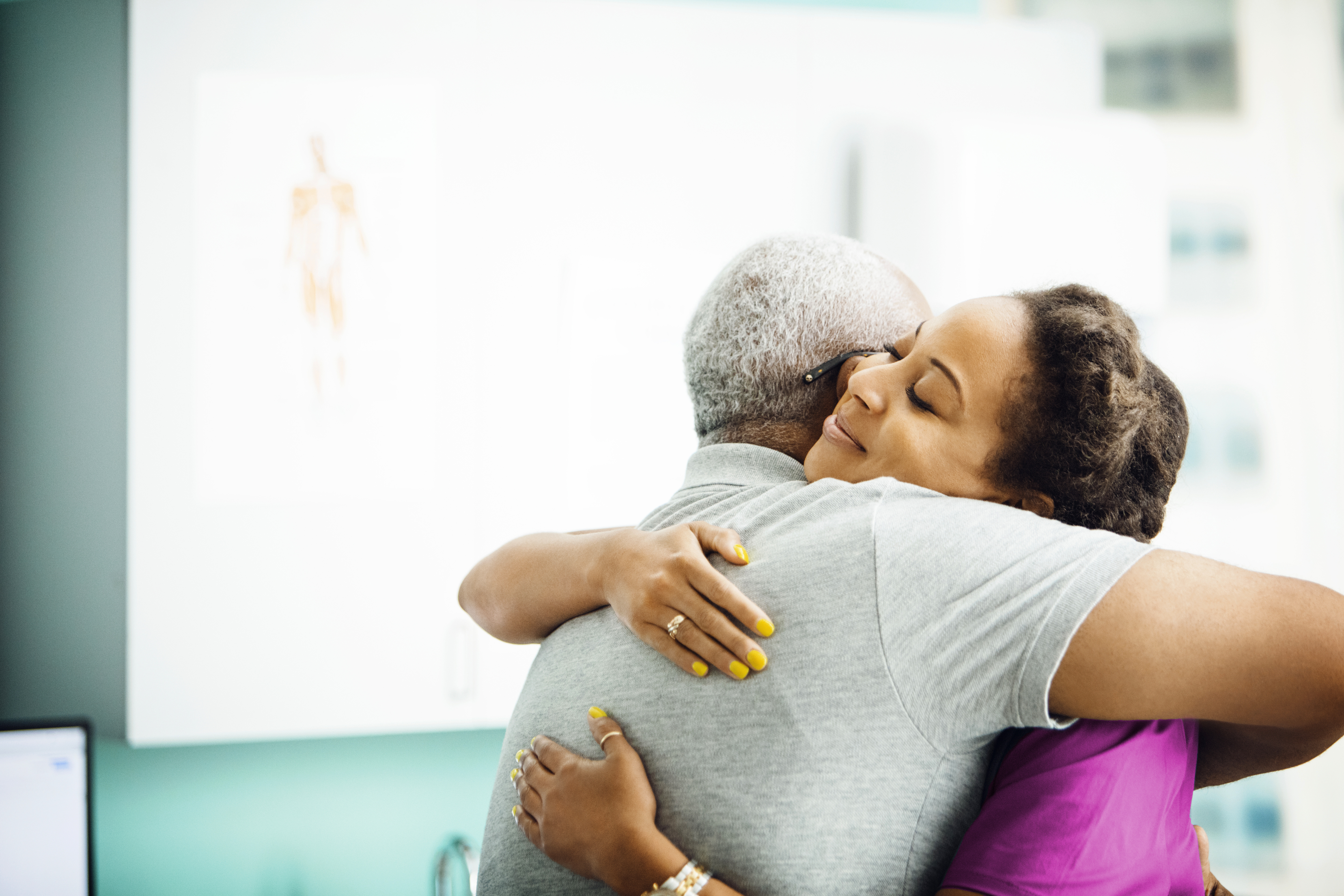 GettyImages-961222238-Patient_Family_Hugging-RET (1)-1